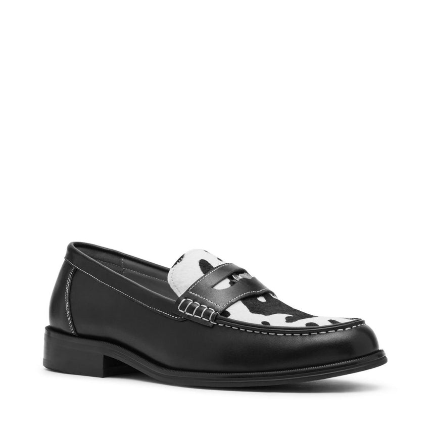 Larrick Black/White Leather Mocasines con Estampado de Vaca 