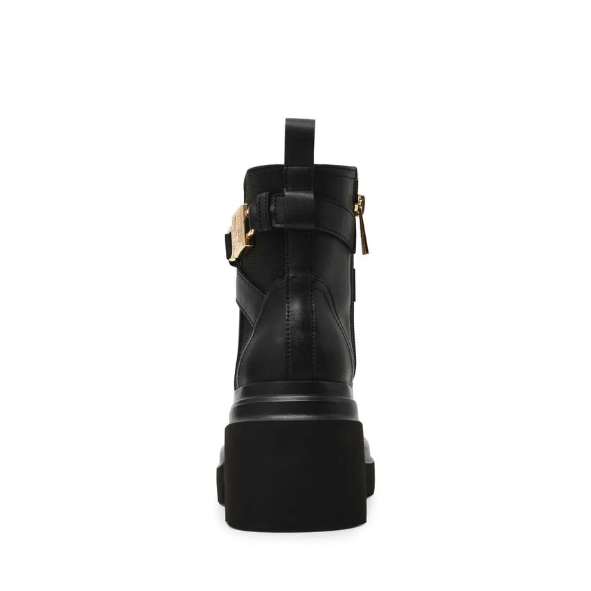 BUCKLED IN BLACK ACTION LEATHER